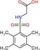 N-[(2,3,5,6-tetramethylphenyl)sulfonyl]glycine
