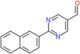 2-(2-Naphthalenyl)-5-pyrimidinecarboxaldehyde