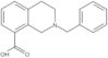 1,2,3,4-Tetrahydro-2-(phenylmethyl)-8-isoquinolinecarboxylic acid