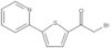 2-bromo-1-[5-(2-pyridinyl)-2-thienyl]-1-ethanone