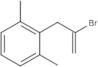 2-(2-Bromo-2-propen-1-yl)-1,3-dimethylbenzene