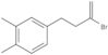 4-(3-Bromo-3-buten-1-yl)-1,2-dimethylbenzene