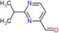 2-(1-Methylethyl)-4-pyrimidinecarboxaldehyde