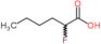 2-fluorohexanoic acid