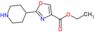 4-Oxazolecarboxylic acid, 2-(4-piperidinyl)-, ethyl ester