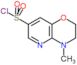 4-methyl-2,3-dihydropyrido[3,2-b][1,4]oxazine-7-sulfonyl chloride