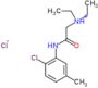 2-[(2-chloro-5-methylphenyl)amino]-N,N-diethyl-2-oxoethanaminium chloride