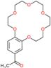 1-(2,3,5,6,8,9,11,12,14,15-decahydro-1,4,7,10,13,16-benzohexaoxacyclooctadecin-18-yl)ethanone