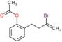 [2-(3-bromobut-3-enyl)phenyl] acetate