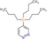 4-(tributylstannanyl)pyridazine