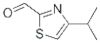 2-Thiazolecarboxaldehyde, 4-(1-methylethyl)- (9CI)