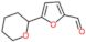 5-tetrahydropyran-2-ylfuran-2-carbaldehyde