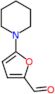 5-(1-Piperidinyl)-2-furancarboxaldehyde