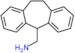 1-(10,11-dihydro-5H-dibenzo[a,d][7]annulen-5-yl)methanamine