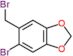 5-bromo-6-(bromomethyl)-1,3-benzodioxole