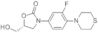 (R)-3-(3-FLUORO-4-THIOMORPHOLINOPHENYL)-5-(HYDROXYMETHYL)OXAZOLIDIN-2-ONE