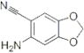 1,3-Benzodioxole-5-carbonitrile, 6-amino-