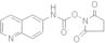 2,5-Pyrrolidinedione, 1-[[(6-quinolinylamino)carbonyl]oxy]-