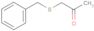 1-[(Phenylmethyl)thio]-2-propanone