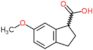 6-methoxy-2,3-dihydro-1H-indene-1-carboxylic acid