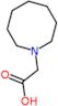 2-(azocan-1-yl)acetic acid