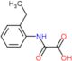 [(2-ethylphenyl)amino](oxo)acetic acid