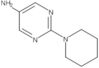 2-(1-Piperidinyl)-5-pyrimidinamine