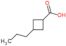 Cyclobutanecarboxylic acid, 3-propyl-