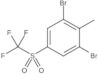 1,3-Dibromo-2-methyl-5-[(trifluoromethyl)sulfonyl]benzene