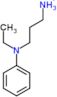 3-[ethyl(phenyl)amino]propan-1-aminium