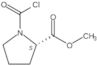 1-(Chlorocarbonyl)-<span class="text-smallcaps">L</span>-proline methyl ester