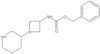 Phenylmethyl N-[1-(3-piperidinyl)-3-azetidinyl]carbamate