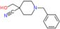 1-benzyl-4-(hydroxymethyl)piperidine-4-carbonitrile