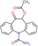 (11-carbamoyl-5-oxo-6H-benzo[b][1]benzazepin-6-yl) acetate