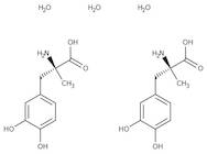 (-)-3,4-Dihydroxy-alpha-methyl-L-phenylalanine sesquihydrate, 99%