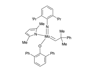 [2,6-Bis(1-methylethyl)benzenaminato(2-)](2,5-dimethyl-1H-pyrrol-1-yl)(2-methyl-2-phenylpropylidene)([1,1':3',1''-terphenyl]-2'-olato) molybdenum(VI), paraffin formulated pellet