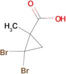 2,2-Dibromo-1-methyl-cyclopropanecarboxylic acid