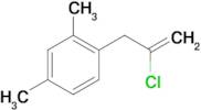 2-Chloro-3-(2,4-dimethylphenyl)-1-propene