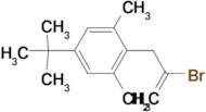 2-Bromo-3-(4-tert-butyl-2,6-dimethylphenyl)-1-propene