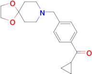 cyclopropyl 4-[8-(1,4-dioxa-8-azaspiro[4.5]decyl)methyl]phenyl ketone