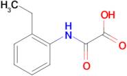 [(2-ethylphenyl)amino](oxo)acetic acid