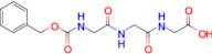 3,6,9-Trioxo-1-phenyl-2-oxa-4,7,10-triazadodecan-12-oic acid