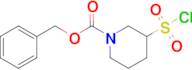 BENZYL 3-(CHLOROSULFONYL)PIPERIDINE-1-CARBOXYLATE