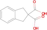 1,3-dihydro-2H-indene-2,2-dicarboxylic acid