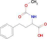 2-[(methoxycarbonyl)amino]-4-phenylbutanoic acid