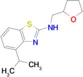 4-isopropyl-N-(tetrahydrofuran-2-ylmethyl)-1,3-benzothiazol-2-amine