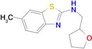 6-methyl-N-(tetrahydrofuran-2-ylmethyl)-1,3-benzothiazol-2-amine