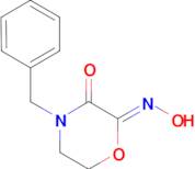 (2Z)-4-benzyl-2-(hydroxyimino)morpholin-3-one