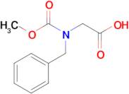 2-(Benzyl(methoxycarbonyl)amino)acetic acid