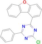 2-Chloro-4-(1-dibenzofuranyl)-6-phenyl-1,3,5-triazine